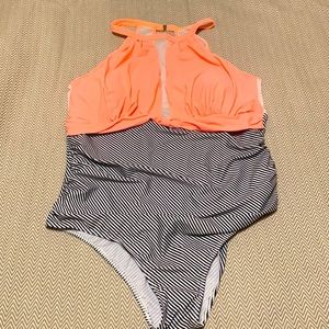 NWT. Aqua Eve one-piece swimsuit. Bright peach with striped bottom. Size 20W.